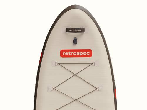 Close-up view of the Weekender XL Inflatable Stand Up Paddle Board 11’ nose featuring a red "retrospec" logo, elastic bungee cords, and a textured grip surface with focus on the action mount.