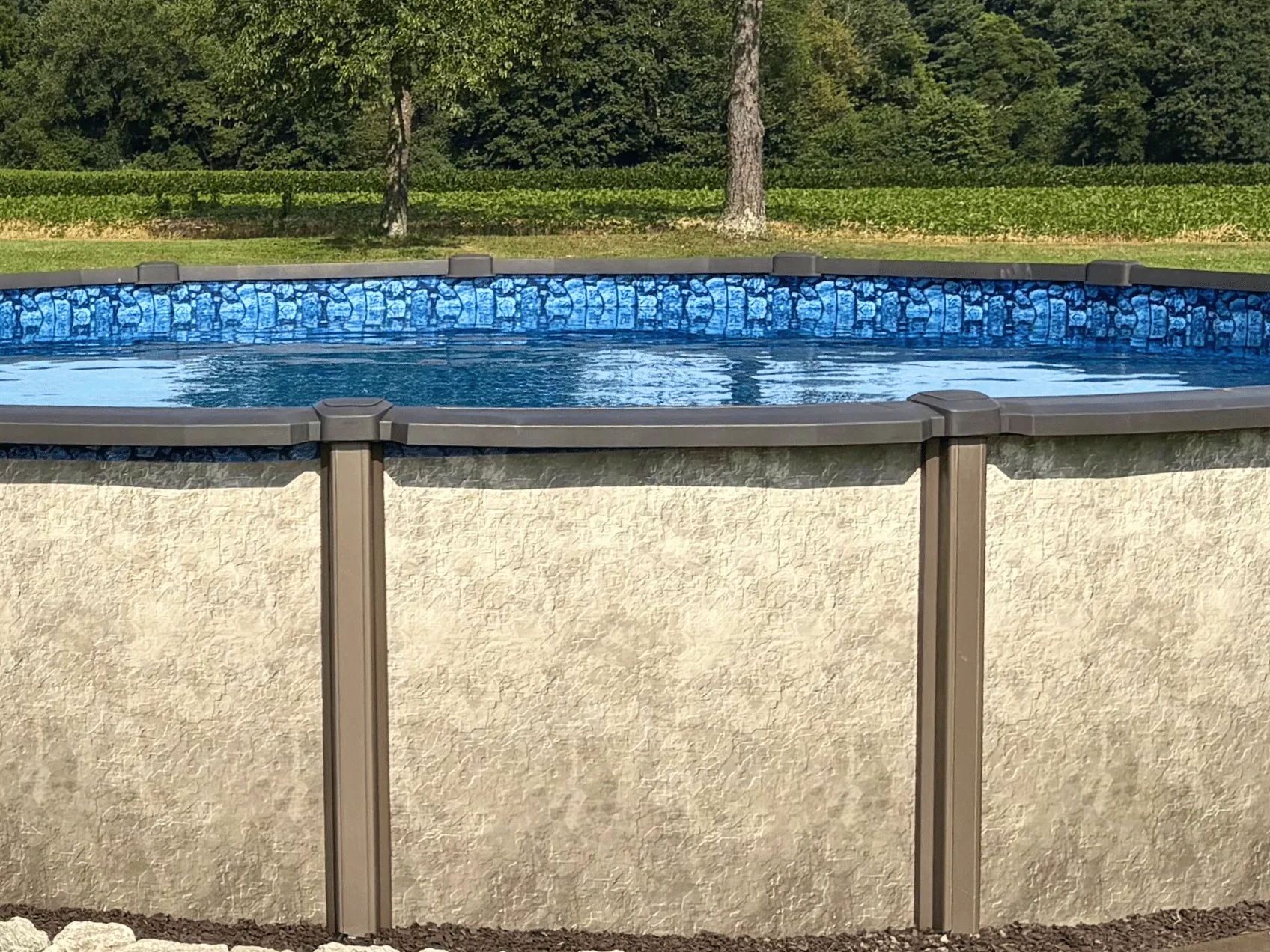 Inspire round overlap pool liner in a Saltwater LX round pool