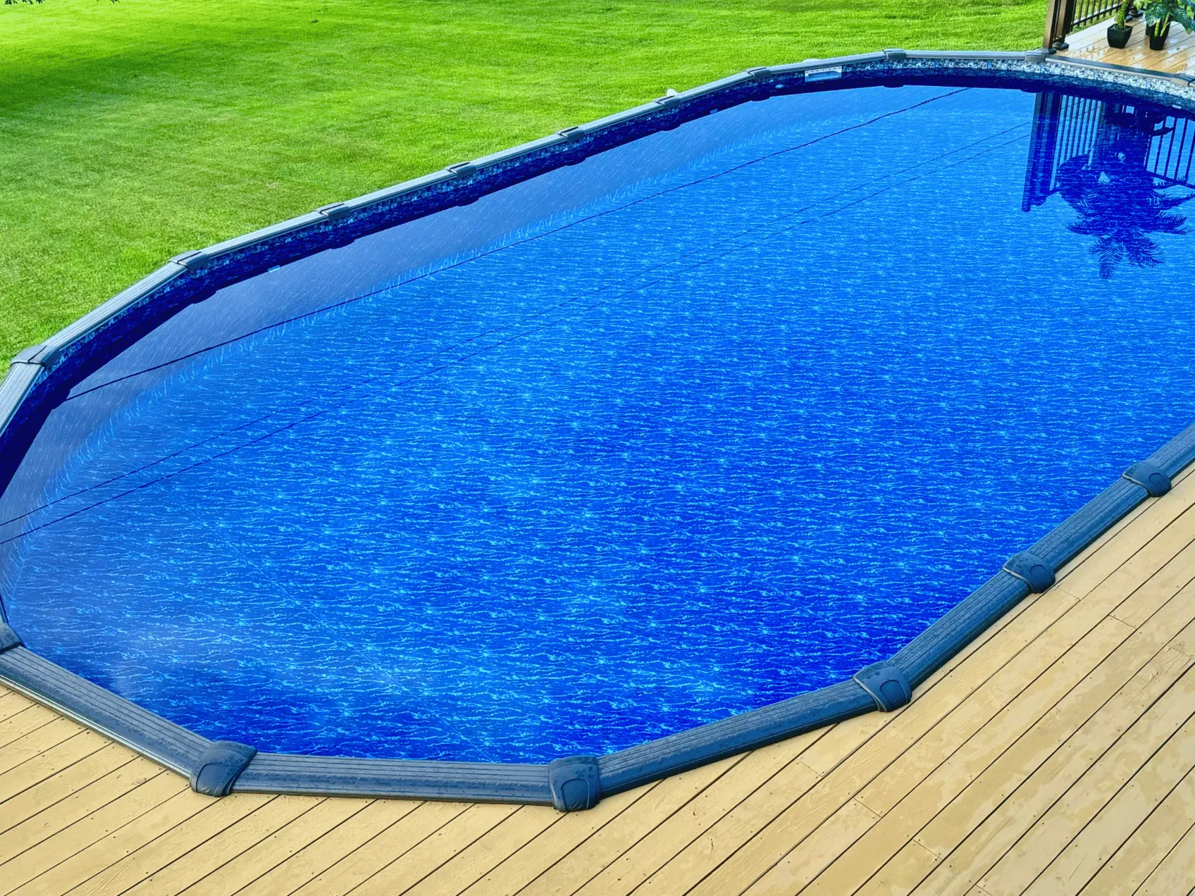 Soho oval J-Hook pool liner in a Melenia oval pool 
