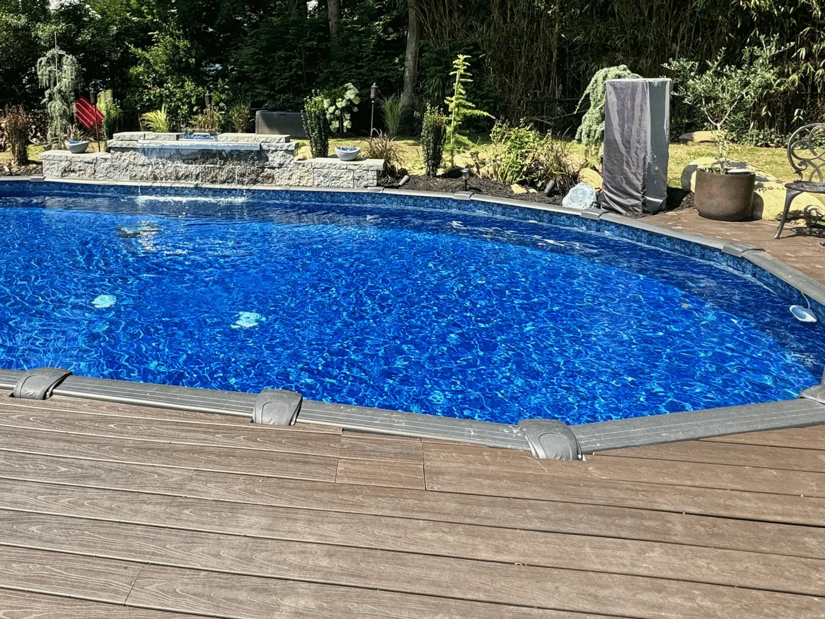 Soho oval J-Hook pool liner in a Melenia Oval pool 