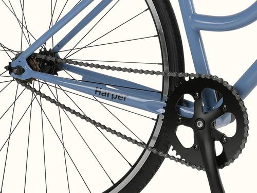 Close-up of a blue bicycle's rear wheel, chain, and crankset with the name "Harper" on the frame.