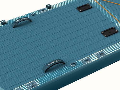 Close-up of the textured deck pad of the June Nano Kids Inflatable Paddle Board Kayak Hybrid.