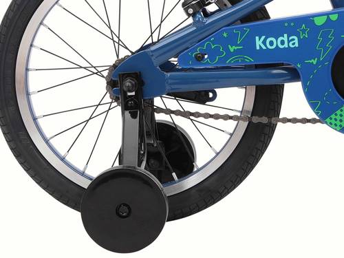 Close-up of a blue Koda 16 Inch kid's bike wheel with a chain guard and training wheel.