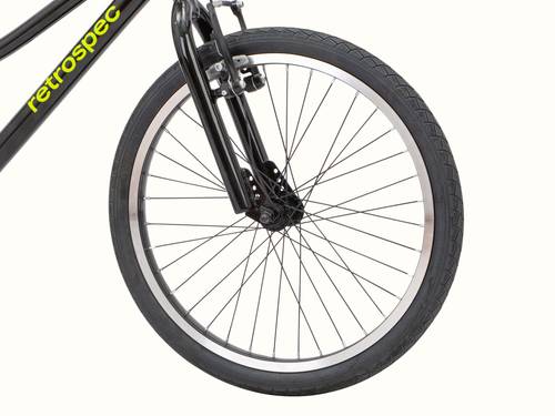 Close-up of a bike wheel with "retrospec" branding on the frame, white background.