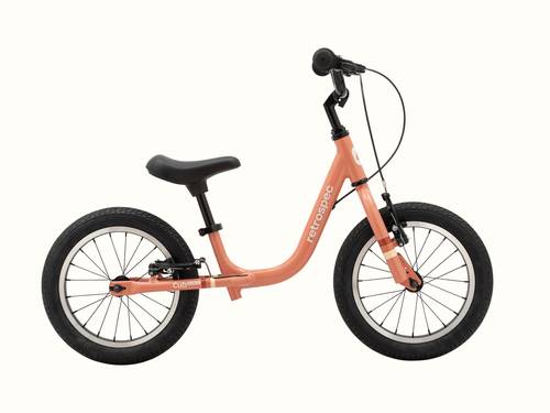 Kids' Cub Plus XL rose pink-colored balance bike with black seat and tires against a white background.