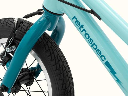 Close-up of the Robin's Egg Blue Koda Plus 12" Kids' bicycle frame with brand "retrospec" and a lightening bolt decal, and the black tire on a white background.