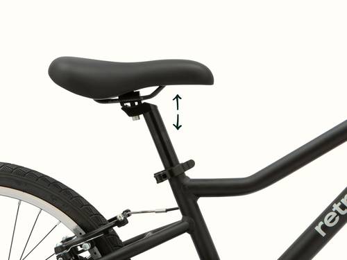 Koda Plus 20" Bicycle seat with adjustable height marked by arrows on a white background.