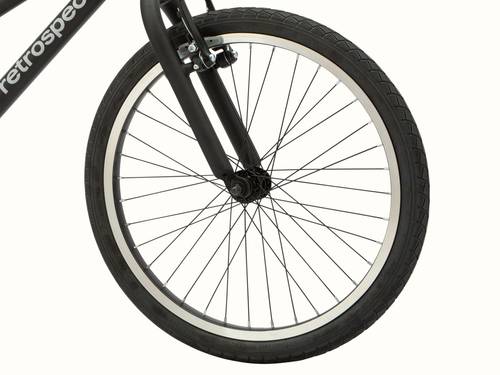 Close-up of a Koda Plus 20" Kids' Bicycle wheel, tire, and partial fork on a white background.