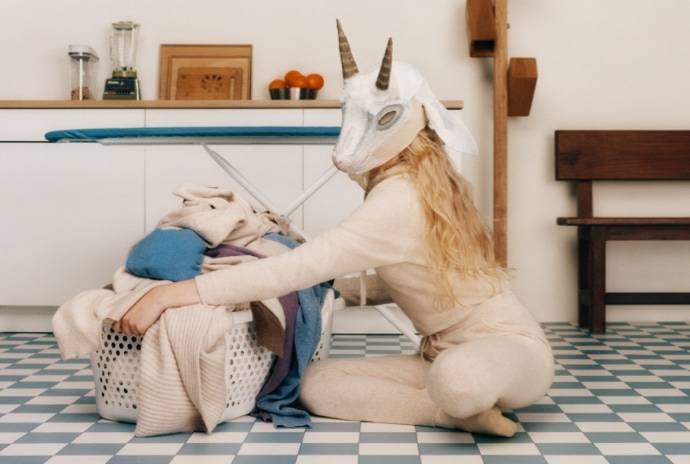 Man and Woman in Goat Mask wearing Essential Cashmere Sets