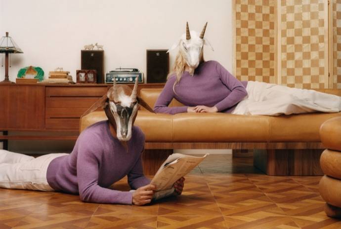 Man and Woman in Goat Head wearing $75 Cashmere Sweater in Amethyst Purple