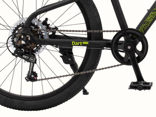 Close-up of the Dart Plus 24" Kids' Bicycle's rear wheel, gears, chain, and pedal mechanism, with "Dart Plus" branded on the frame in neon green, on a white background.