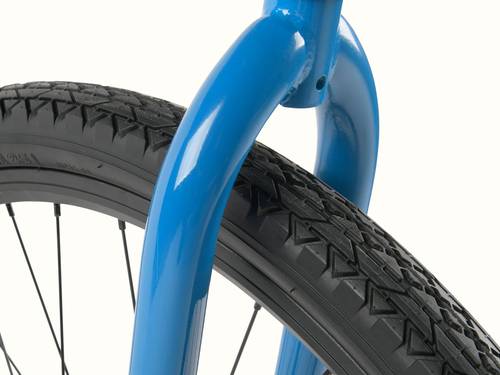 Close-up of a blue bicycle fork with a textured black tire, showcasing the wheel's rims, spokes, and the vibrant paint finish.