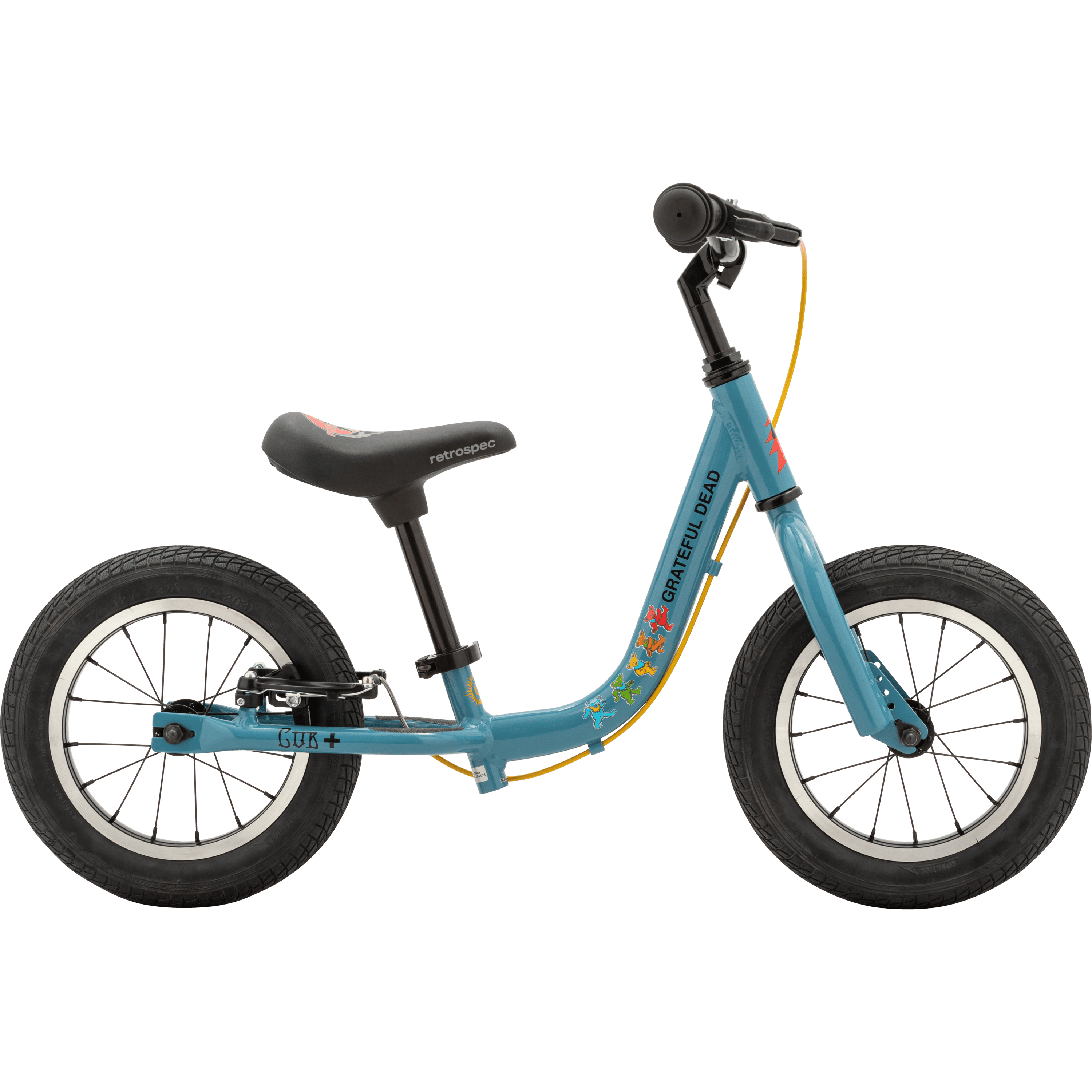 A blue Cub Plus balance bike with a black seat and colorful Grateful Dead designs including the dancing bears, featuring two wheels and a sleek frame for toddlers.