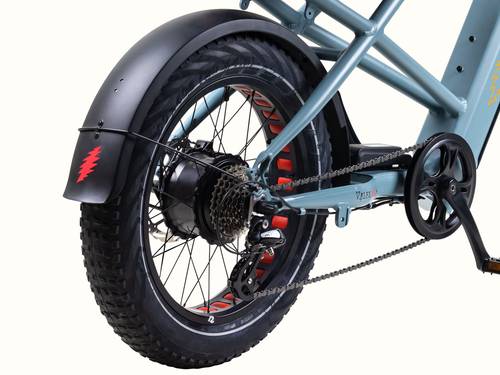 Close-up of the Grateful Dead Valen Rev+ Electric Fat Tire Bike's rear wheel, featuring a large tire, black fender with red accents, and a geared hub motor.