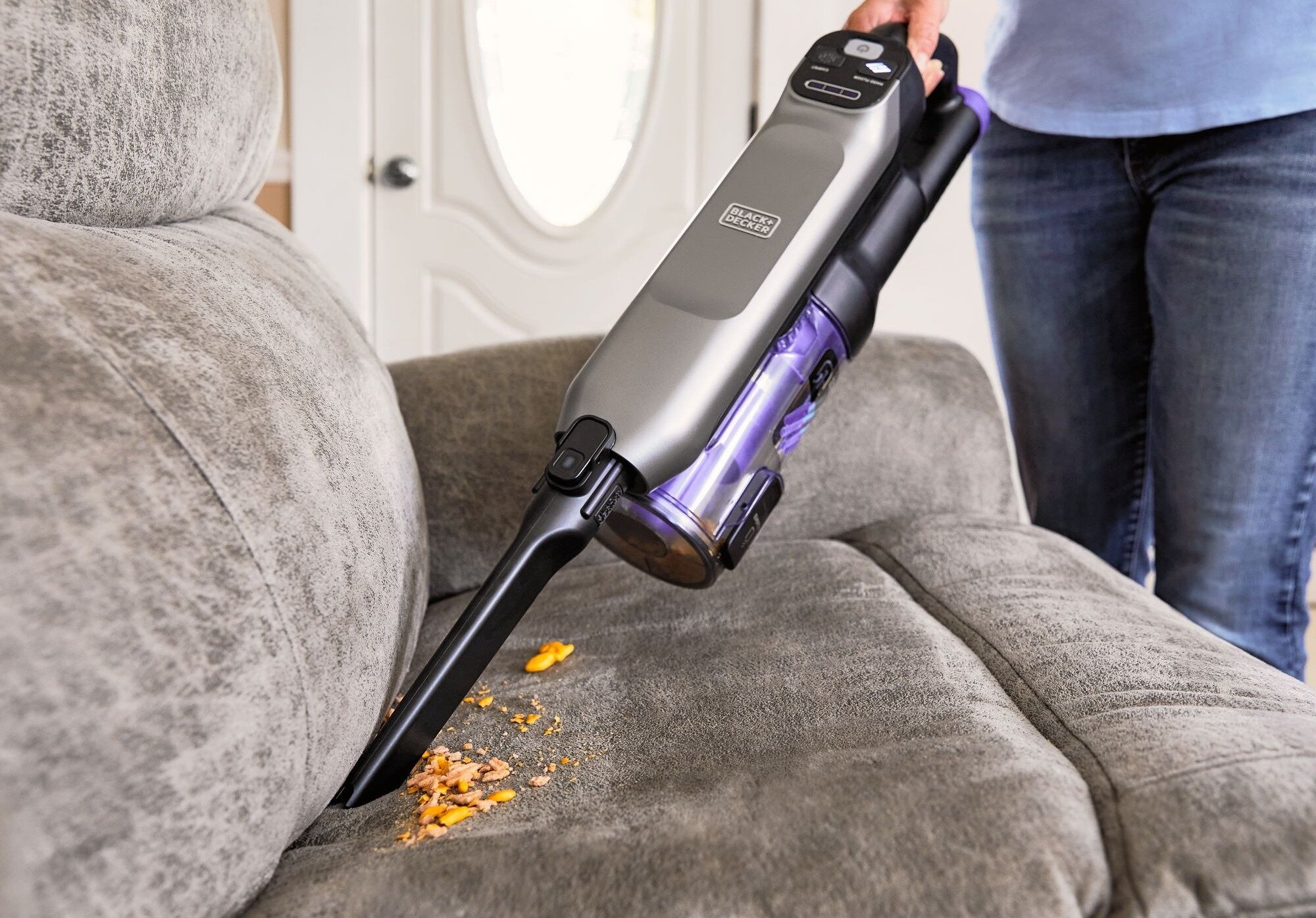 A close-up of someone using the BLACK AND DECKER BHFEA640WG