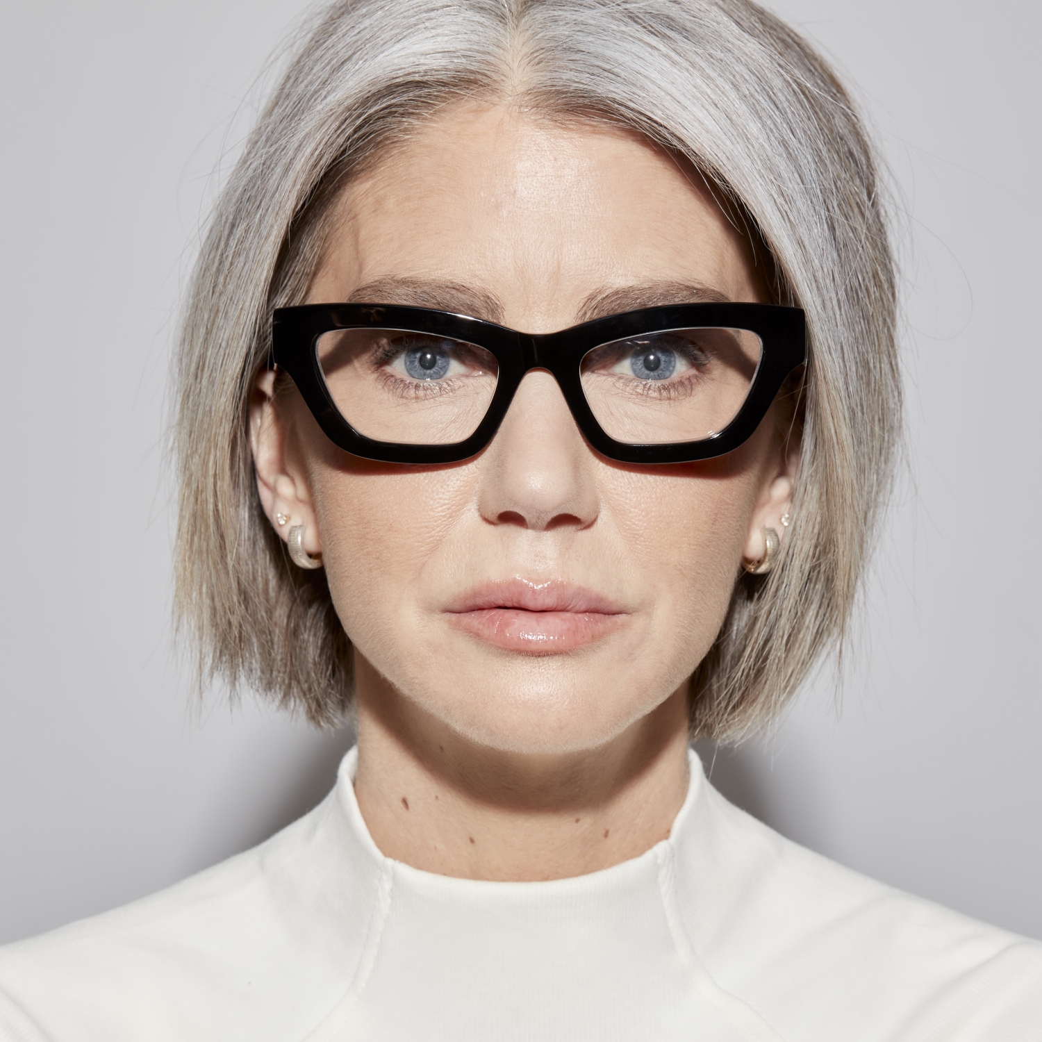 Photo of a man or woman wearing Jade Black Reading Glasses by French Kiwis