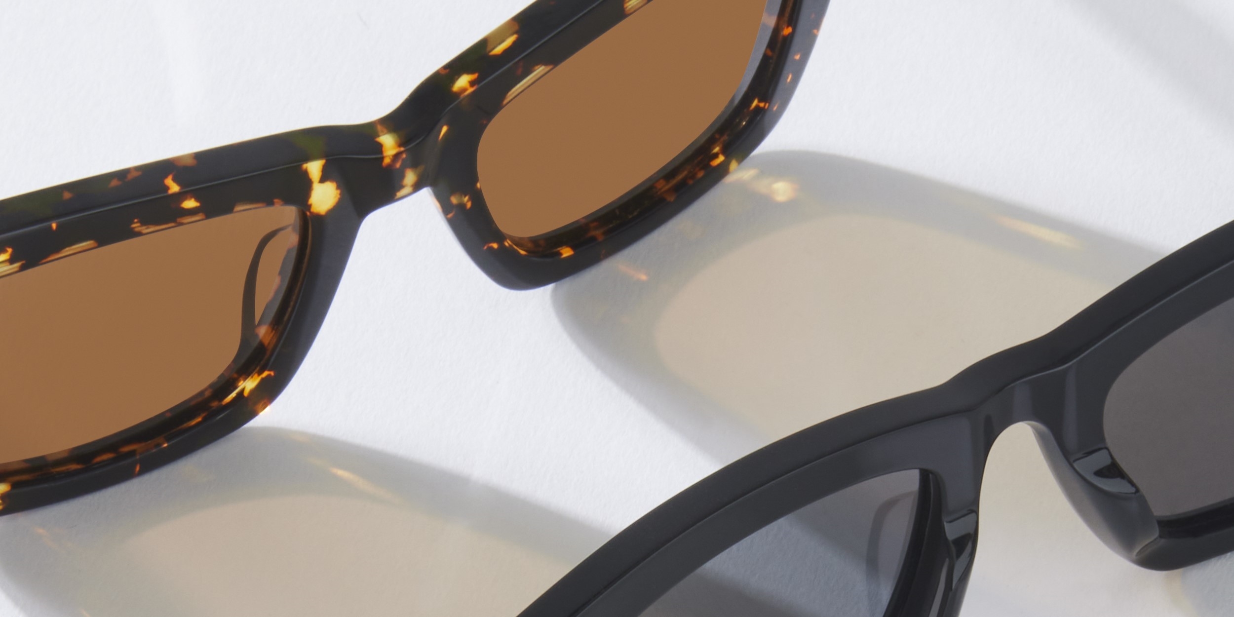 Photo Details of Manu Sun Black Sun Glasses in a room