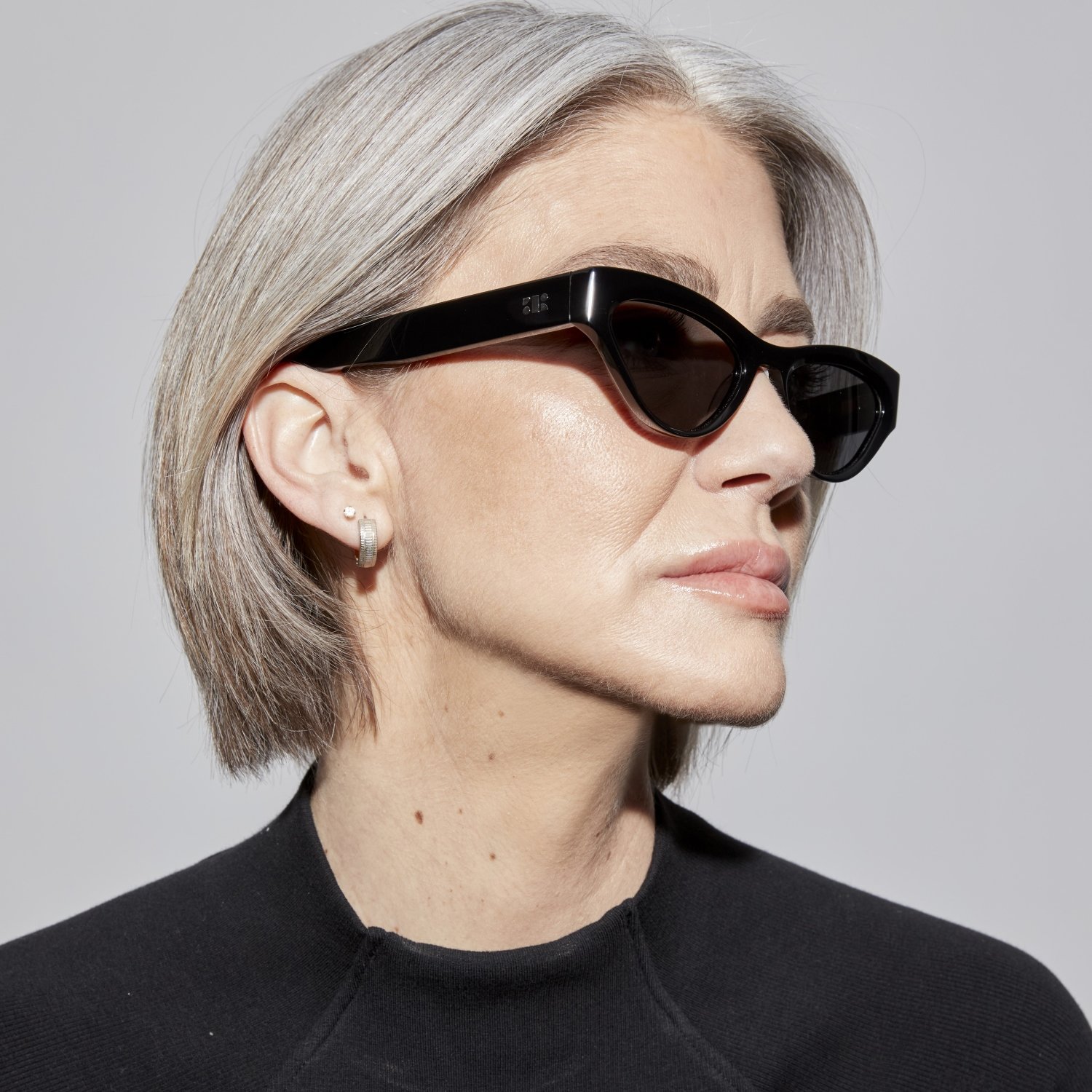 Photo of a man or woman wearing Marion Sun Black Sun Glasses by French Kiwis