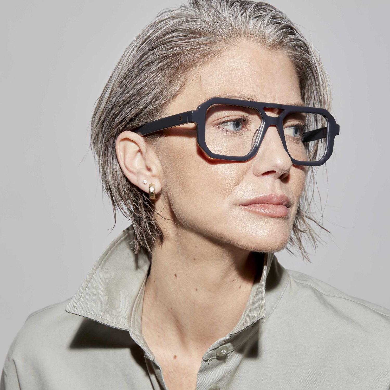 Photo of a man or woman wearing Angelo Army Green Reading Glasses by French Kiwis