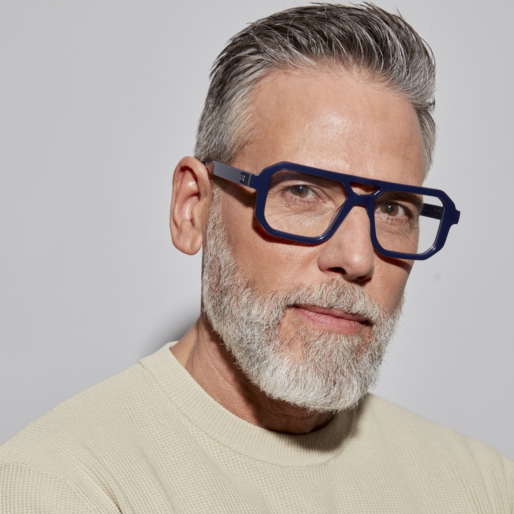 Photo of a man or woman wearing Angelo Dark Grey Reading Glasses by French Kiwis