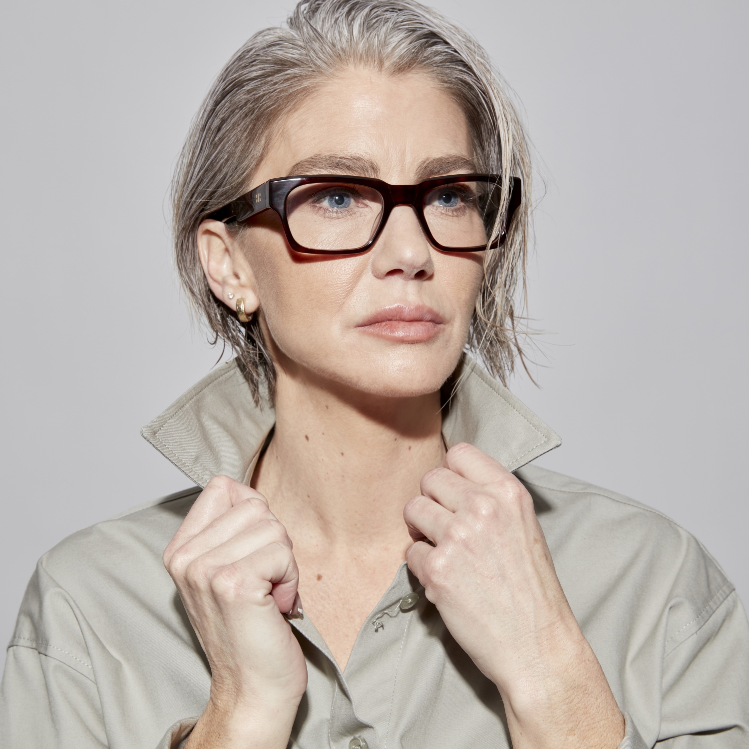 Photo of a man or woman wearing Leon Clear Grey Marble Reading Glasses by French Kiwis