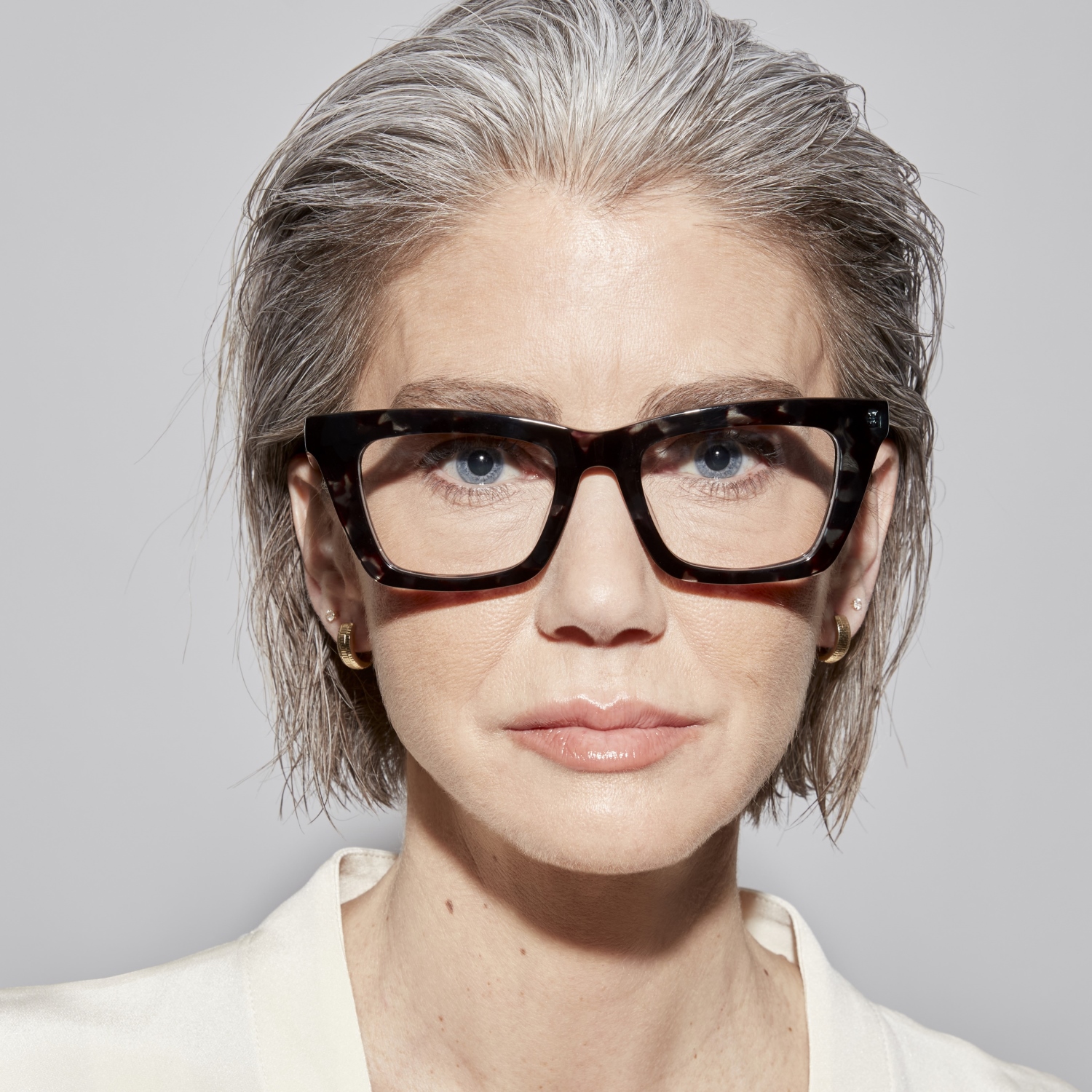Photo of a man or woman wearing Manu Grey Marble Reading Glasses by French Kiwis
