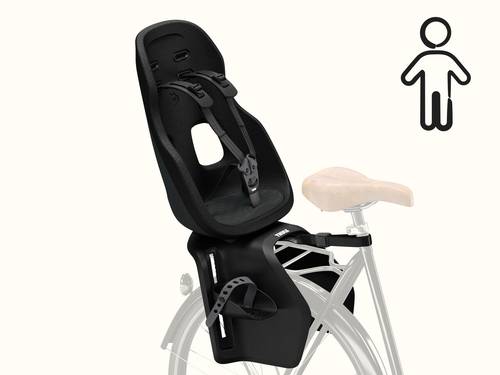 The Thule Yepp Nexxt 2 Maxi Child Bike Seat mounted onto the rear rack of a bike.
