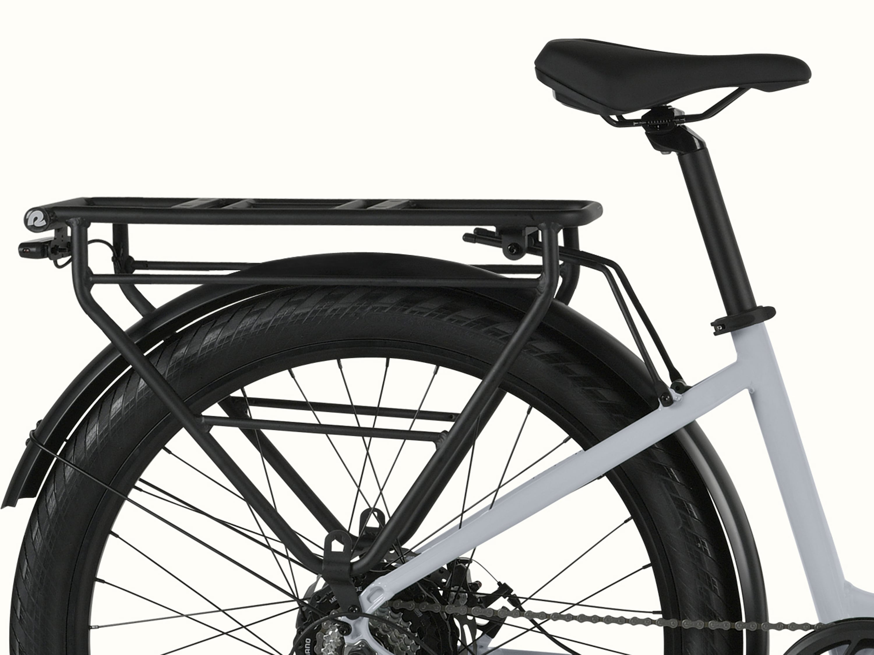 A close-up of the rear rack on the Abbot Rev 2 Step Through Electric Bike.