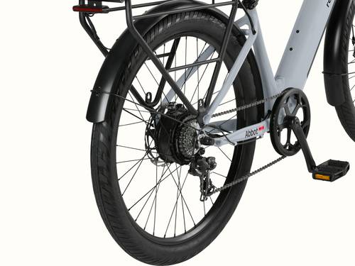 A close up the rear wheel of the gray Abbot Rev 2 EBike with a black fender and rear rack with integrated taillight.