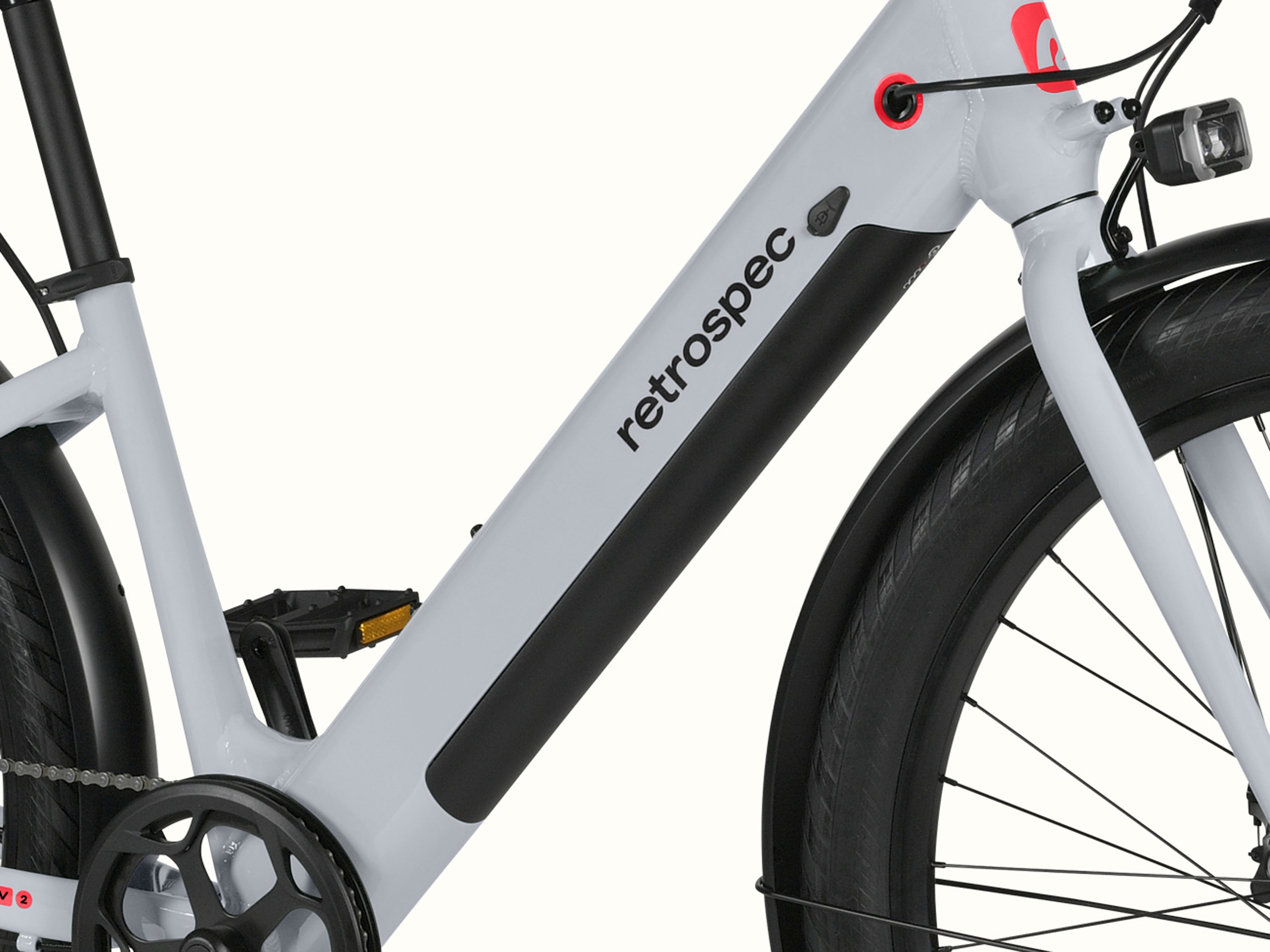 A close-up of the frame on the Abbot Rev 2 Step Through EBike showcasing the black case battery.