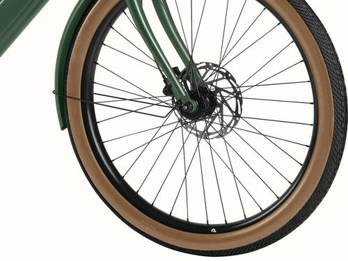A close up of the wheel on the Beaumont Rev+ EBike on a white background.