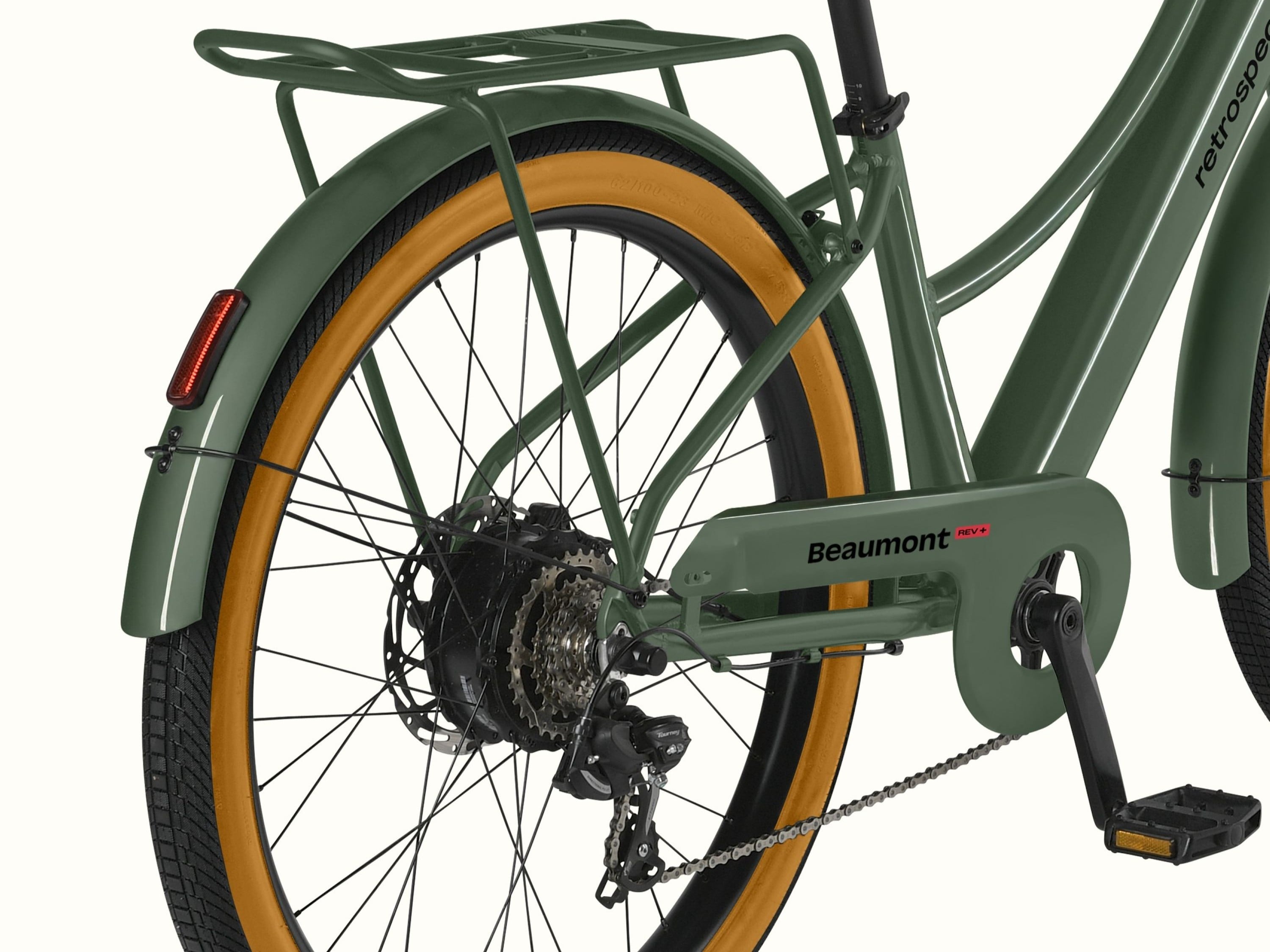 A cropped image of the removable rear wheel on the Beaumont Rev+ Electric Bike with a rear rack and fender with taillight.