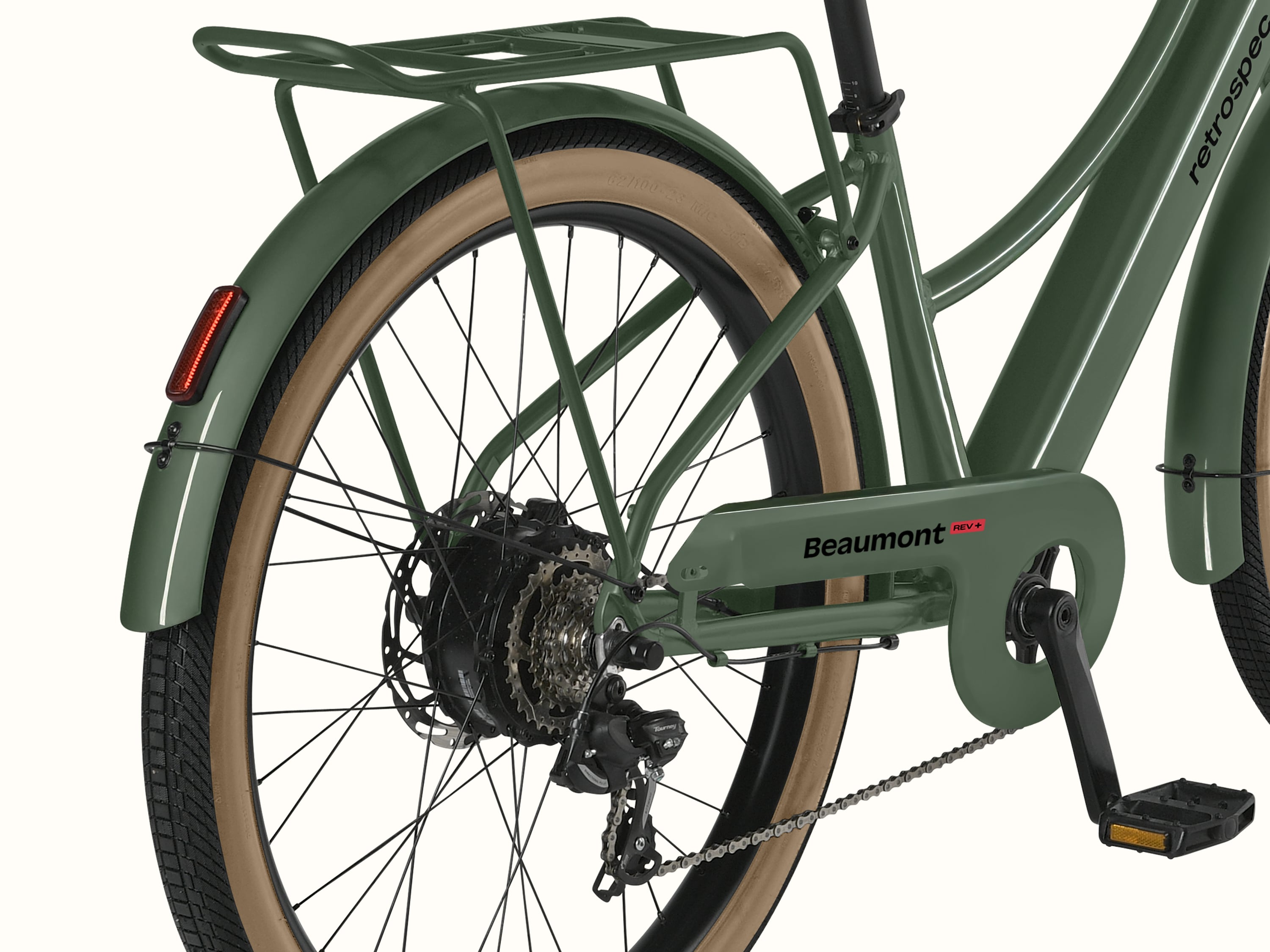 A cropped image of the removable rear wheel on the Beaumont Rev+ Electric Bike with a rear rack and fender with taillight.