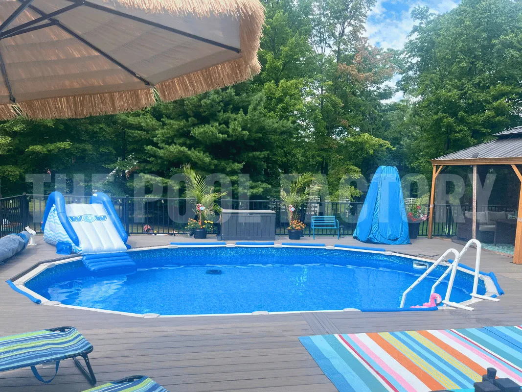 Above ground Saltwater 5000 Lazer Oval Pool with full deck and pool accessories.