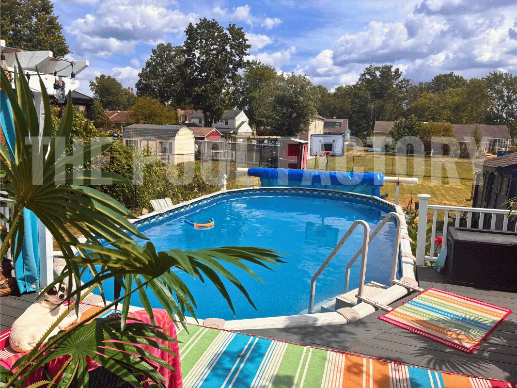 Above ground Saltwater 5000 Lazer Oval Pool with full deck setup and solar cover.