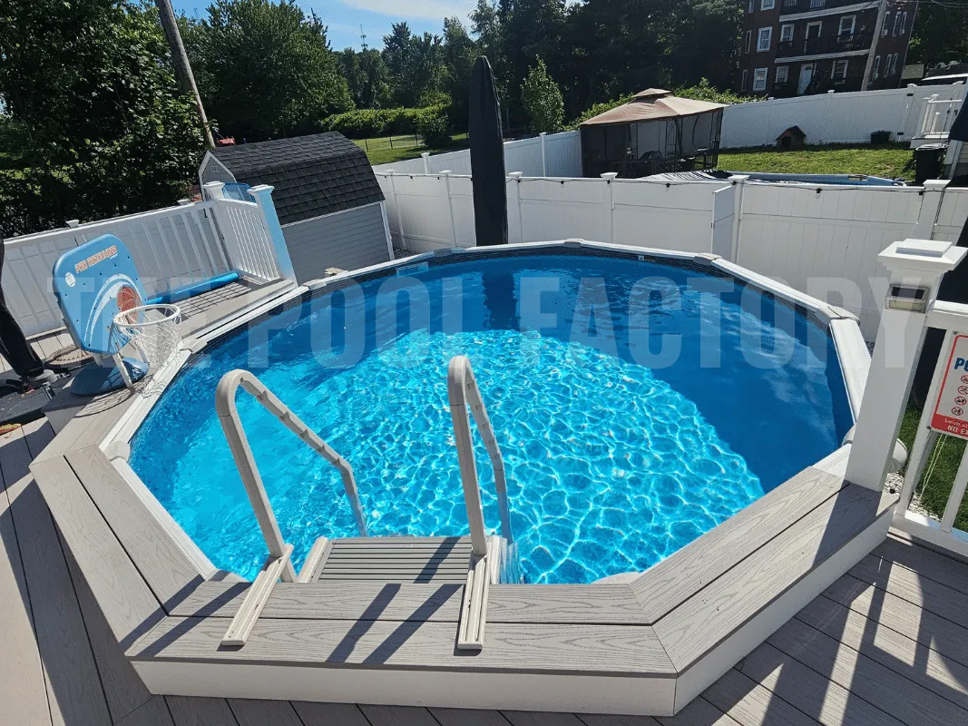 Saltwater 5000 Lazer pool surrounded by wood decking and basketball hoop.