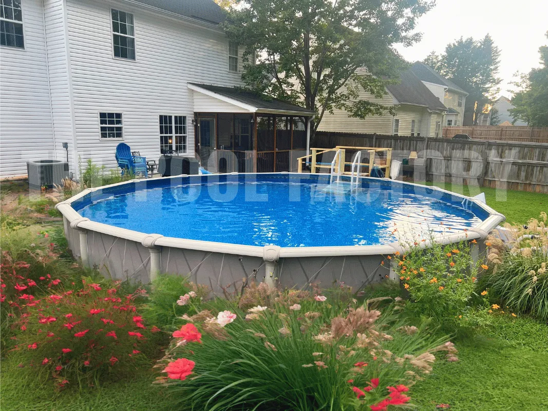 Saltwater 5000 Lazer Round Pool with beautifully landscaped backyard and eye-catching flower garden.