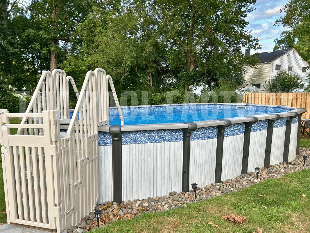 Saltwater Titan Oval Pool with Confer SES Step Enclosure System and overlap Bahama liner.