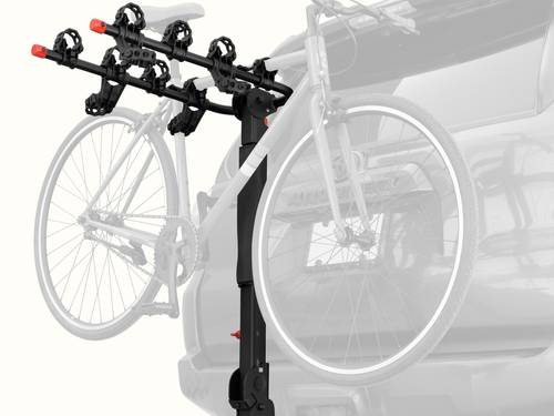 retrospec Lenox Plus Hitch Mount Car Bike Rack (4-Bikes) installed on an SUV with one bike secured in the padded frame cradles, shown from a rear three-quarter angle.