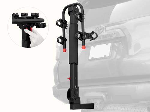 retrospec Lenox Plus Hitch Mount Car Bike Rack (2-4 Bikes) installed on the rear of a Toyota 4Runner, shown empty in the folded upright position with cradle arms raised and red safety caps in place.