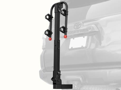 retrospec Lenox Hitch Mount Car Bike Rack (2-4 Bikes) installed on the rear of a Toyota 4Runner, shown empty in the folded upright position with cradle arms raised and red safety caps in place.