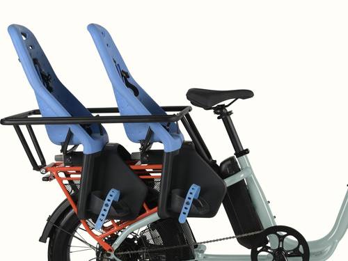 retrospec Roo Rev XL family cargo electric bike with two blue child seats mounted on rear rack with a passenger handrail surrounding them.
