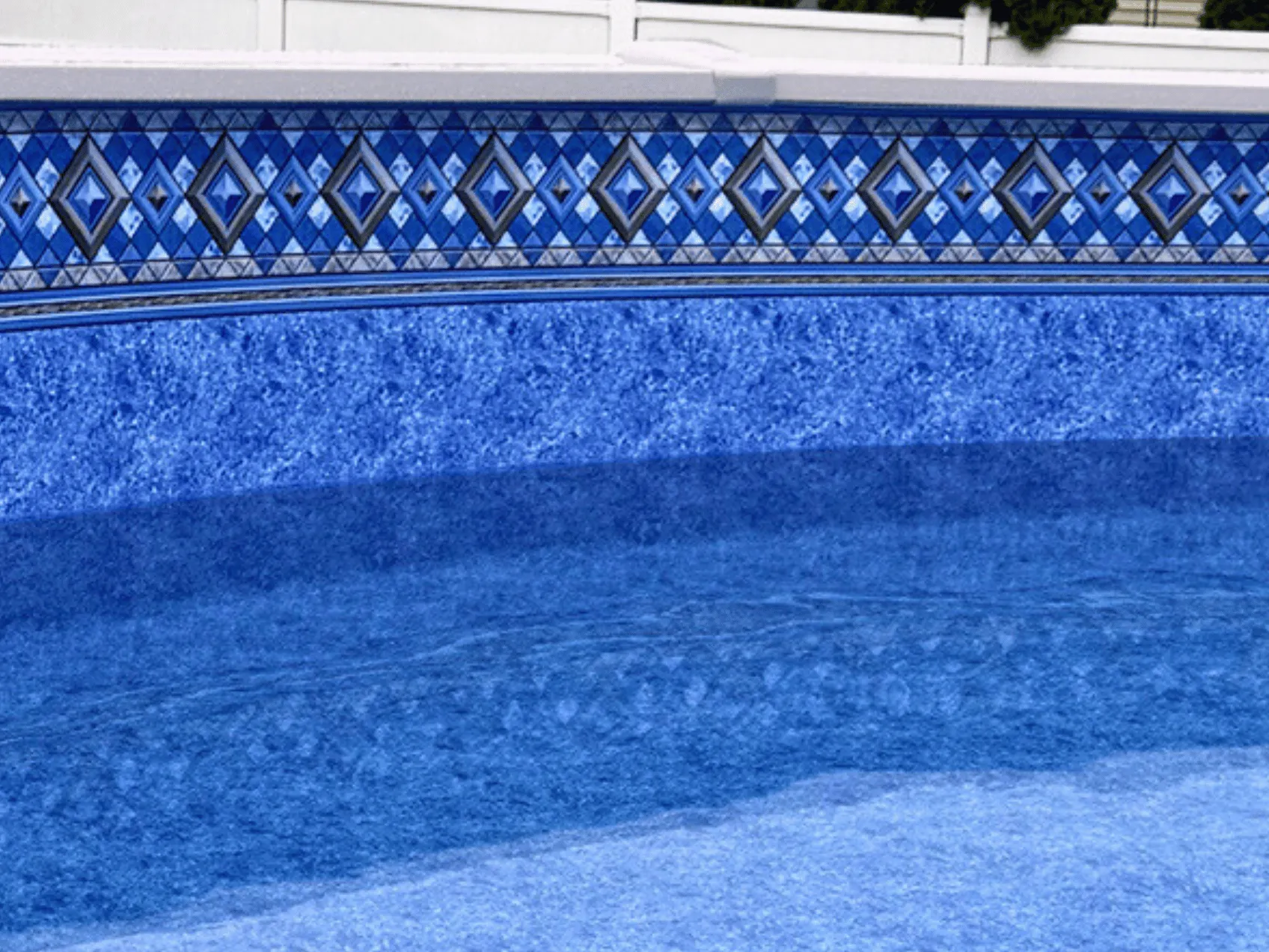 Diamond Key round J-Hook pool liner in a Hampton round pool
