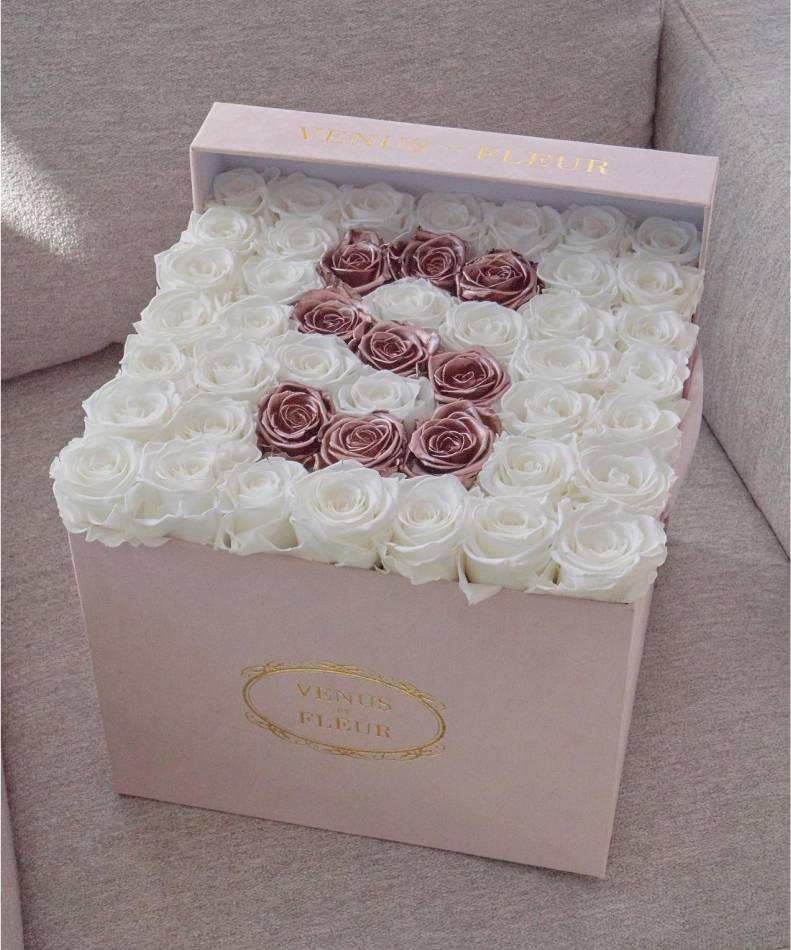 pink Venus et fleur gift basket with white roses and pink roses in the shape of the letter