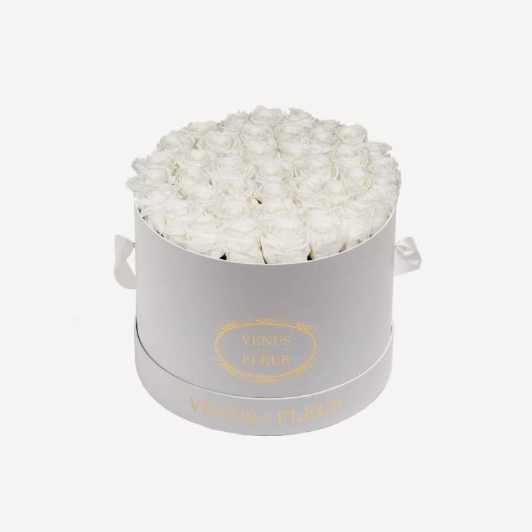 Large round white Venus et Fleur gift box with white roses