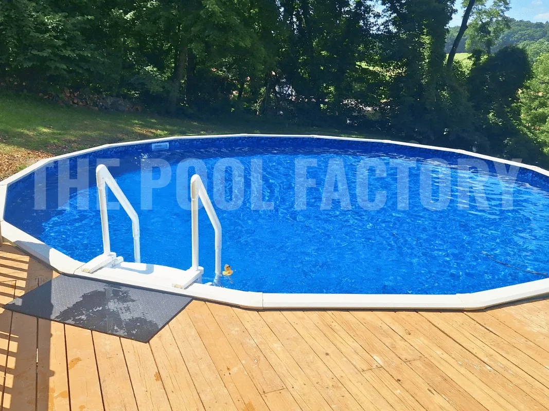 Round above ground pool with clear water surrounded by a modern deck