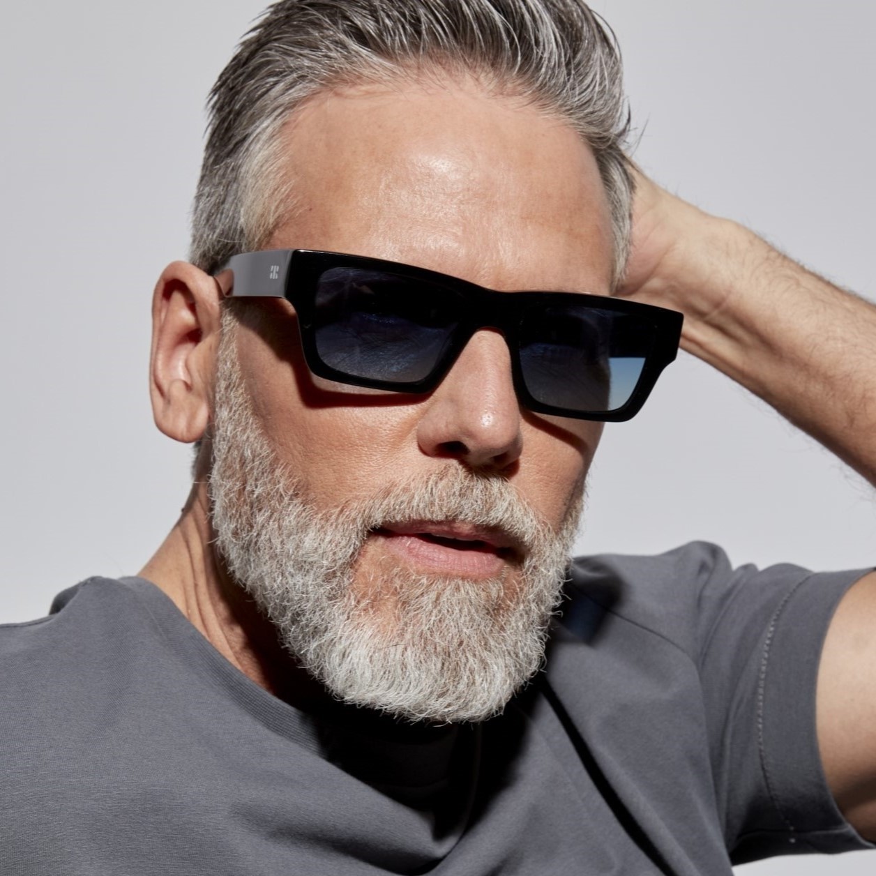 Photo of a man or woman wearing Aimé Sun Clear Dark olive Sun Glasses by French Kiwis