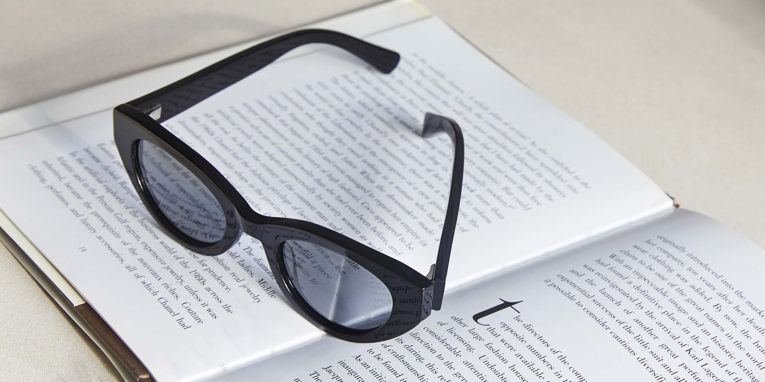 Photo Details of Camille Sun Sand Sun Glasses in a room