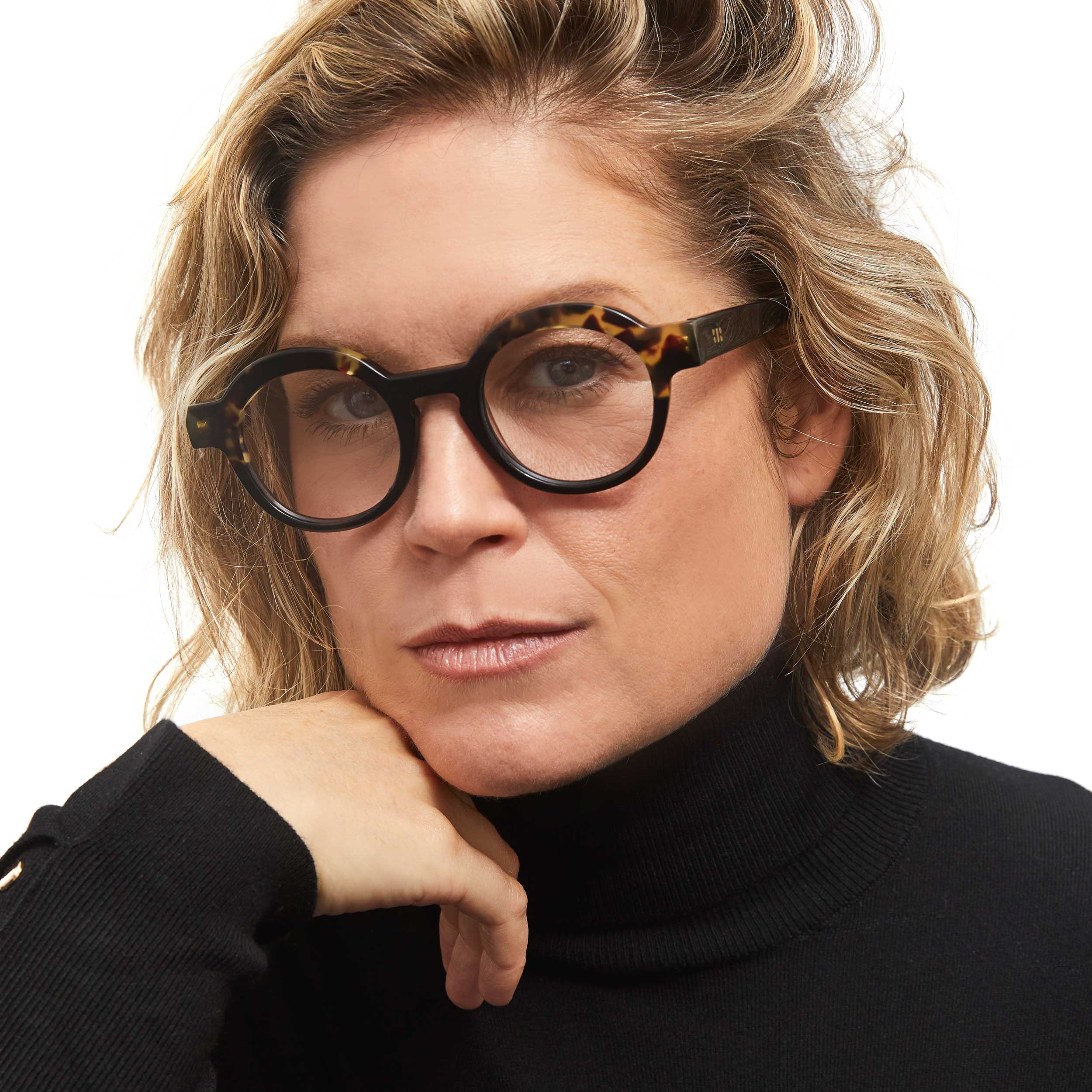 Photo of a man or woman wearing Charlotte Blue Light Clear Burgundy & Blue Marble Blue Light Glasses by French Kiwis