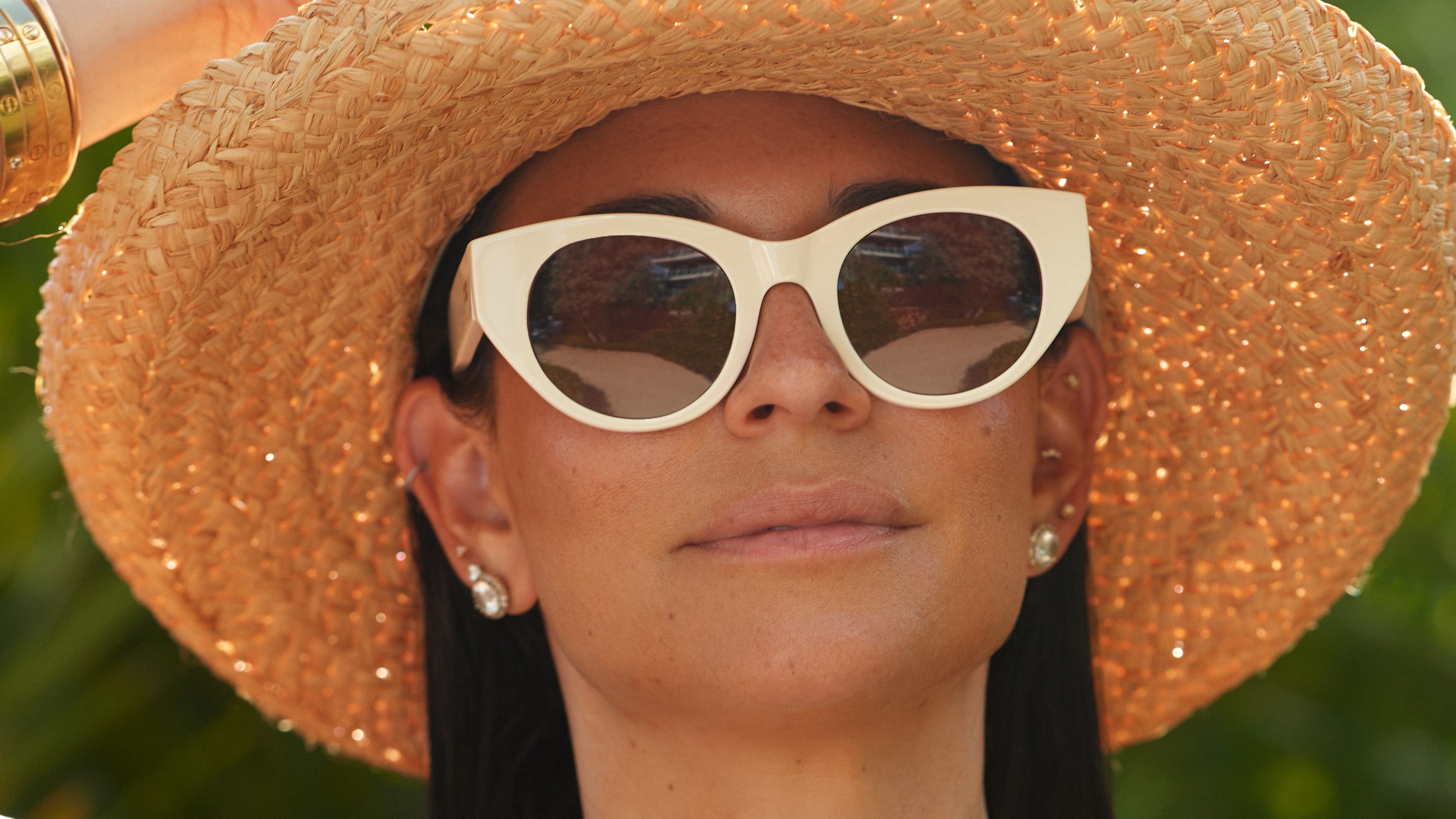 Photo Details of Jackie Sun Sand Sun Glasses in a room